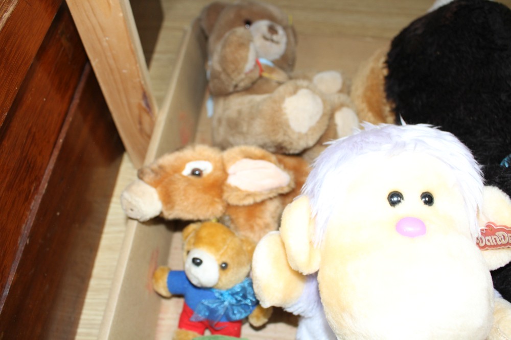 A group of assorted soft toys